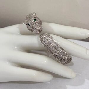 Elegant Silver Panther Ring with Green Accents